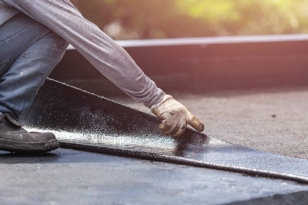 Professional Basement Waterproofing technician working in Athens, TN